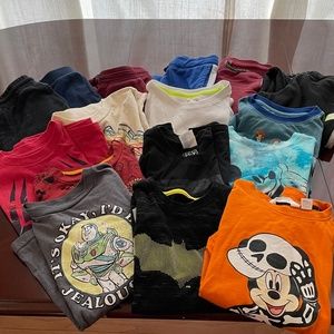 8 pants, 4 long sleeve t-shirts ,6 short sleeve t-shirts and  1 Oshkosh hoodie